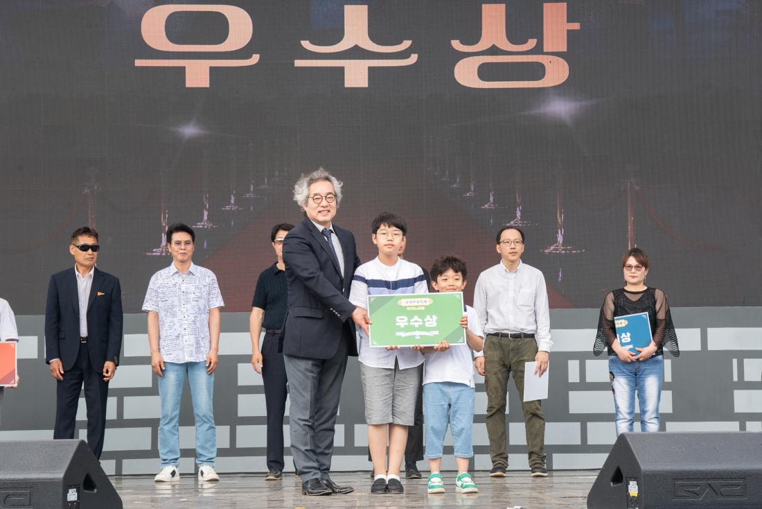 20250615_럭키노래방 시상_7.jpg