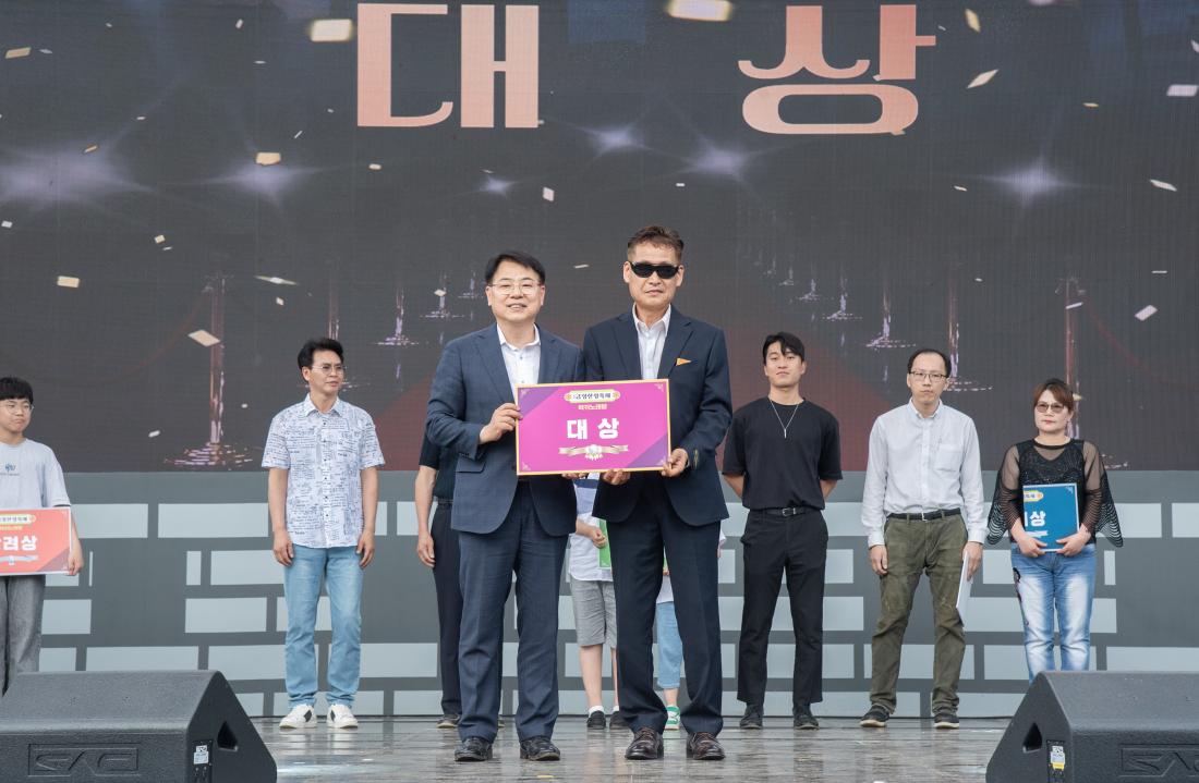 20250615_럭키노래방 시상_4.jpg